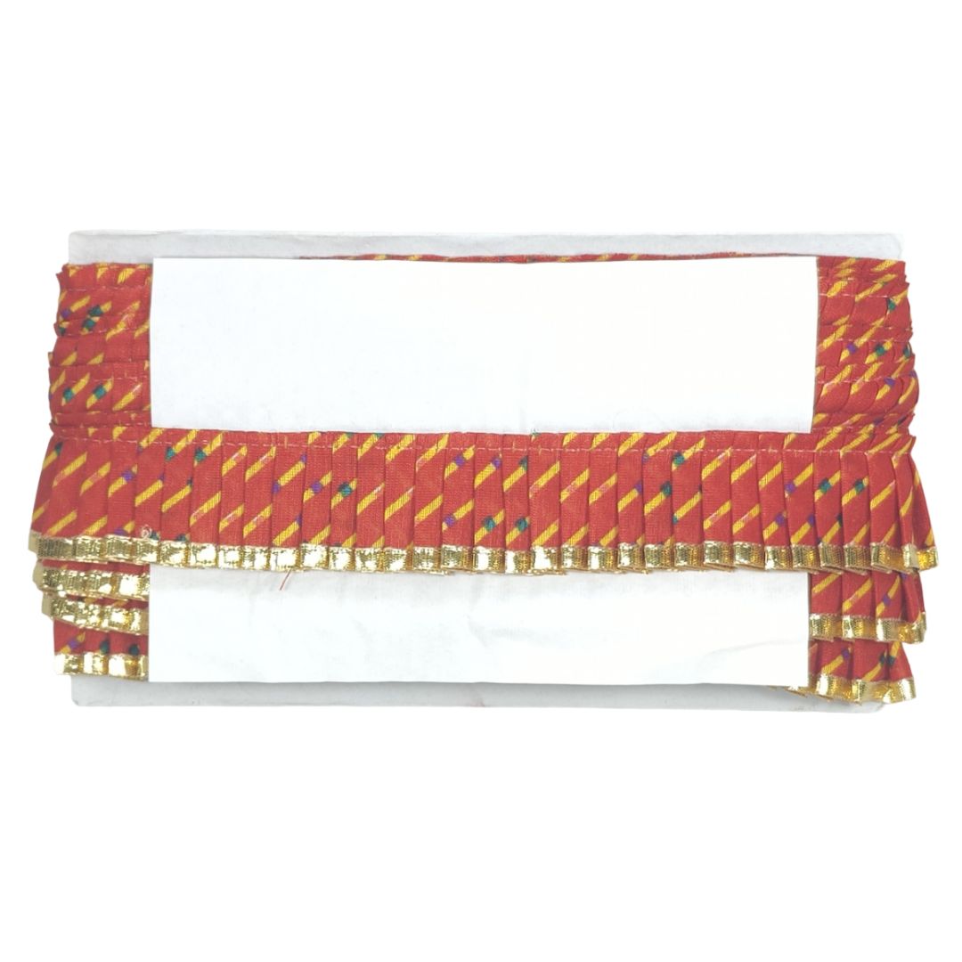 Decorative cornice with red and gold pattern on a white background